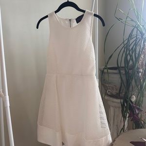 Romeo and Juliet Couture white dress with mesh overlay